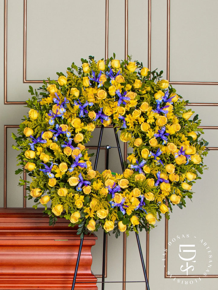 Corona Circular con Rosas Amarillas e Iris arreglo de condolencias con 96 rosas amarillas