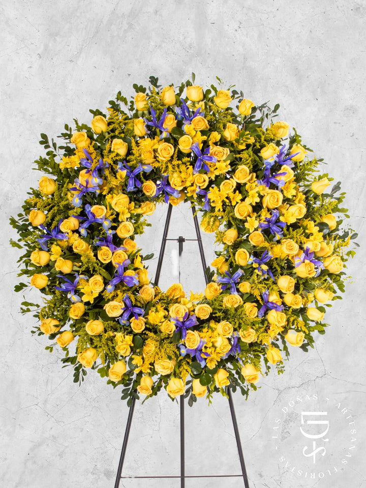 Corona Circular con Rosas Amarillas e Iris arreglo de condolencias con 96 rosas amarillas