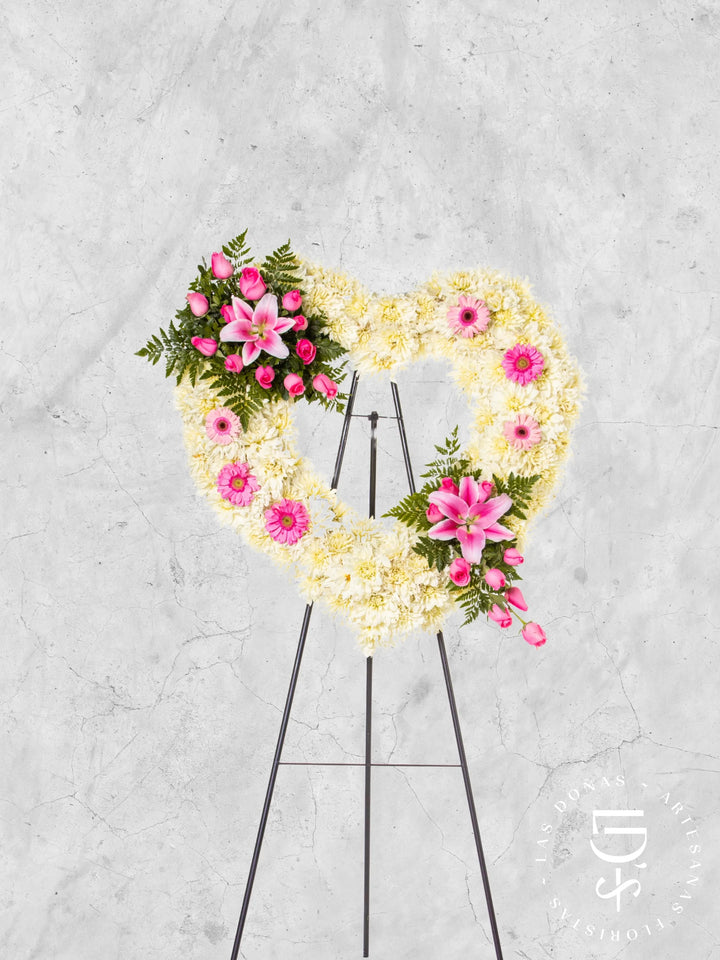 Corona de Corazón con Rosas Rosadas y Gerberas arreglo de condolencias con 24 rosas rosadas