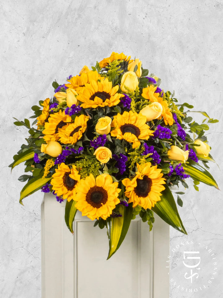 Lágrima de Piso con Rosas Amarillas y Girasoles arreglo de condolencias con 16 rosas amarillas + girasoles