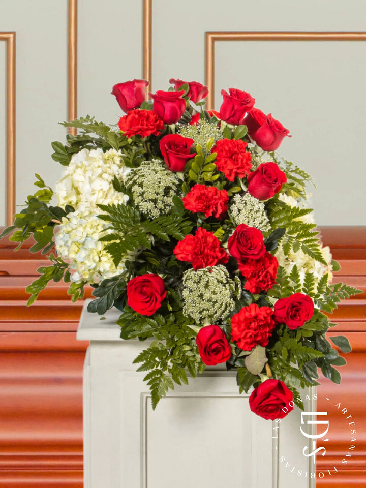 Lágrima de Piso con Rosas Rojas y Gerberas arreglo de condolencias con 12 rosas rojas y clavelon