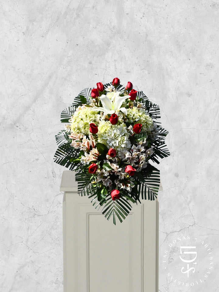 Lágrima de Piso Amor Infinito arreglo de condolencias con 12 rosas rojas