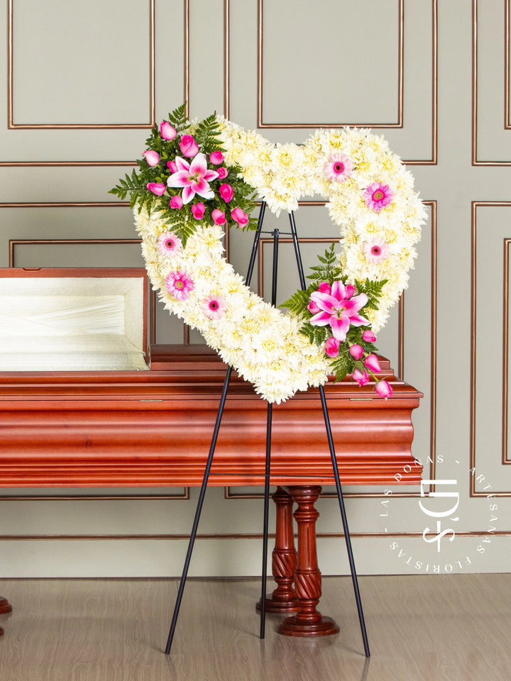 Corona de Corazón con Rosas Rosadas y Gerberas arreglo de condolencias con 24 rosas rosadas